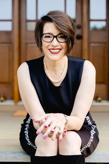Susan-glusica-sittingonstairs-smile-530-350
